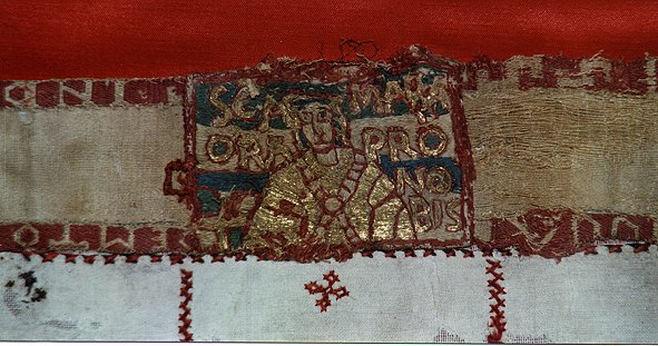 Girona. Sant Feliu. Fragment de l'estola de Sant Narcs amb la inscripci: Ora por nobis. Segle X.