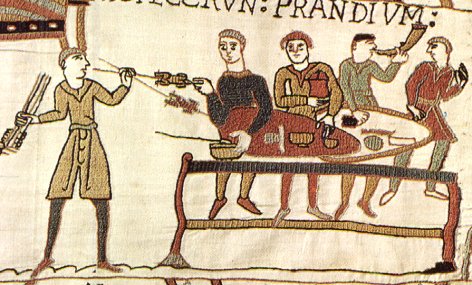Bayeux. Fragment del taps que representa uns nobles menjant damunt uns escuts.. Segle XII. Autoritzaci Ciutat de Bayeux.