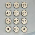 Telfon amb doble numeraci