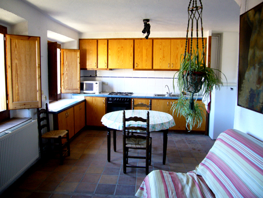 La salle � manger avec la cuisine